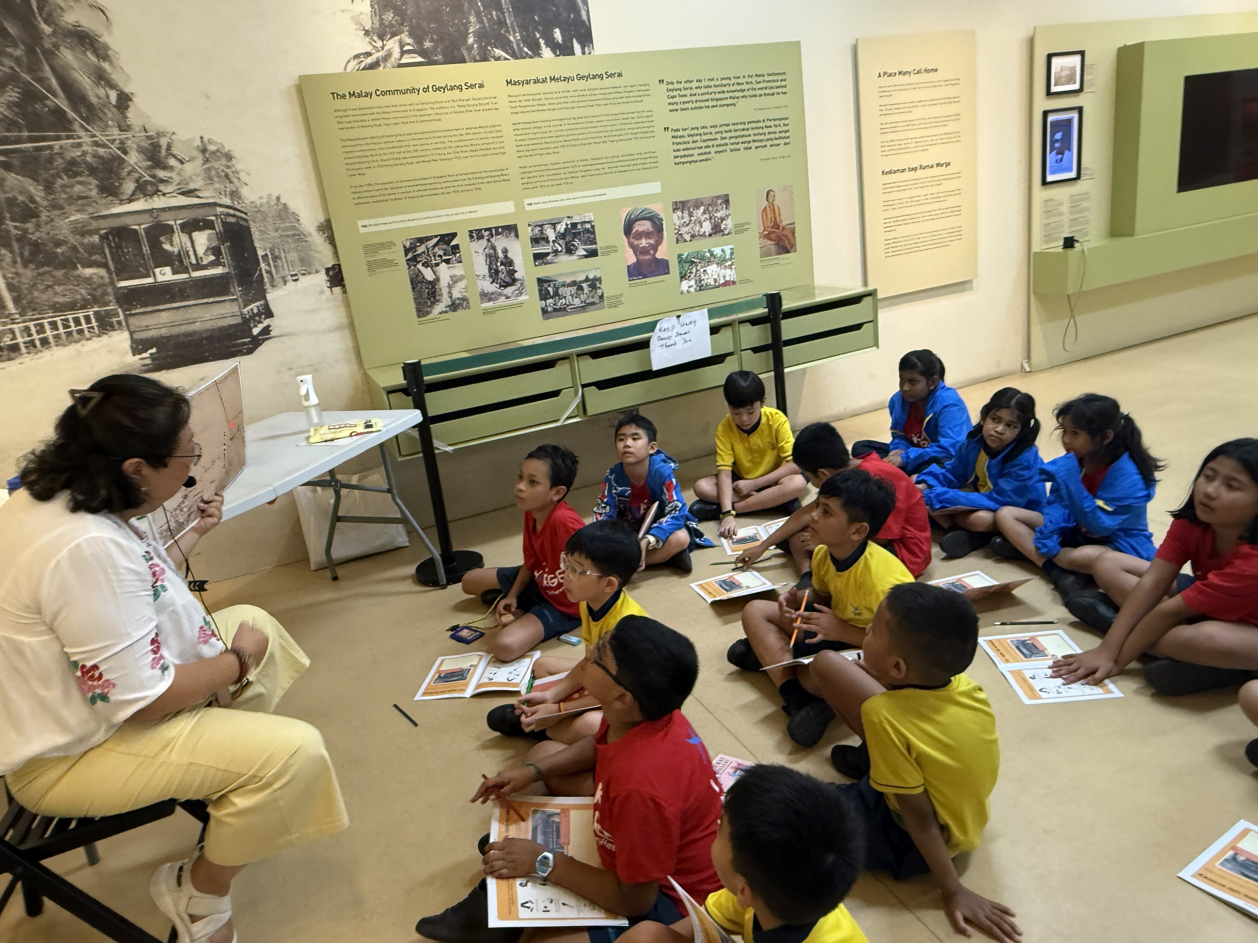 Students listening attentively to the presenter as she gives valuable insights about our Malay community.